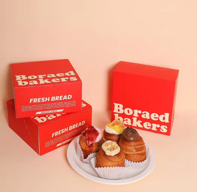 Boraed Bakers bread boxes and pastries